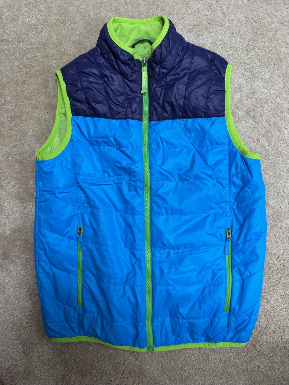 Kids Sz 14/16 L.L. Bean L ightweight Blue and Navy Puffer Vest with Lime Trim.